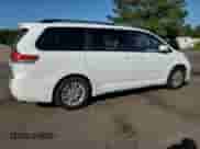 2012 Toyota Sienna XLE AAS with VIN 5TDYK3DC8CS234066, listed as a Copart auction lot 84642265 with 86,921 mi miles and Salvage title. Bid and sale history available at DreamBid. Image 3.