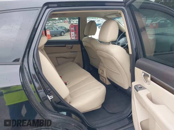 2012 Hyundai Santa Fe GLS z VIN 5XYZG3ABXCG093158, wystawiony jako IAAI lot #42653374 z przebiegiem 233 400 mil mil oraz . Historia ofert i sprzedaży dostępna na DreamBid. Obrazek 8.