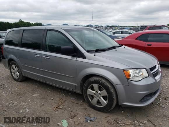 2013 Dodge Grand Caravan SE with VIN 2C4RDGBGXDR651484, listed as a Copart auction lot 56409815 with 246,308 mi miles and Clean title. Bid and sale history available at DreamBid. Image 4.