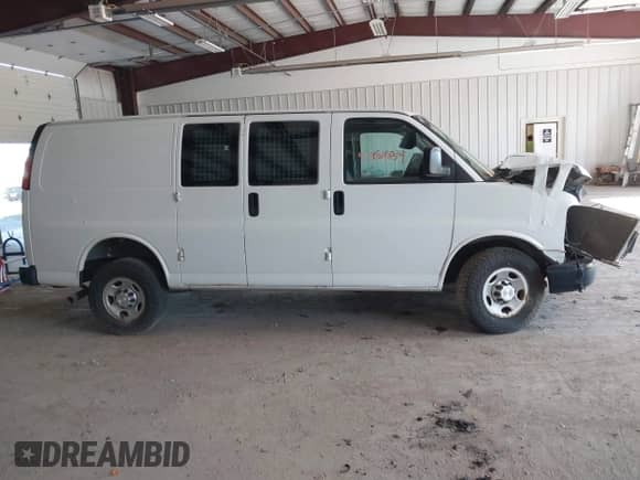 2015 Chevrolet Express Cargo with VIN 1GCZGTCGXF1229754, listed as a IAAI auction lot 41509659 with 252,522 mi miles and . Bid and sale history available at DreamBid. Image 13.