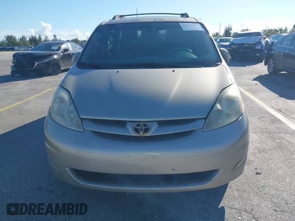 2008 Toyota Sienna XLE z VIN 5TDZK22C18S141253, wystawiony jako IAAI lot #43527112 z przebiegiem 208 796 mil mil oraz . Historia ofert i sprzedaży dostępna na DreamBid. Obrazek 12.