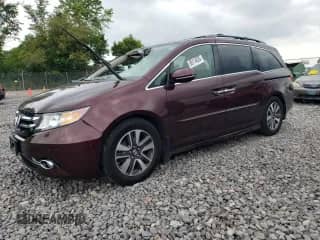 2014 Honda Odyssey Touring с VIN 5FNRL5H90EB030588, выставлен на аукционе Copart как лот 69114835 с пробегом 126 659 миль миль и Чистый • Clean title. История ставок и продаж доступна на DreamBid. Изображение 1.