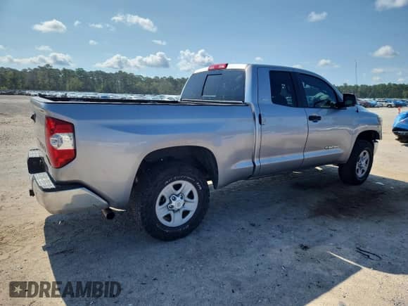 2019 Toyota Tundra SR с VIN 5TFRM5F12KX143986, выставлен на аукционе Copart как лот 69851445 с пробегом 142 082 миль миль и Списание • Salvage title. История ставок и продаж доступна на DreamBid. Изображение 3.