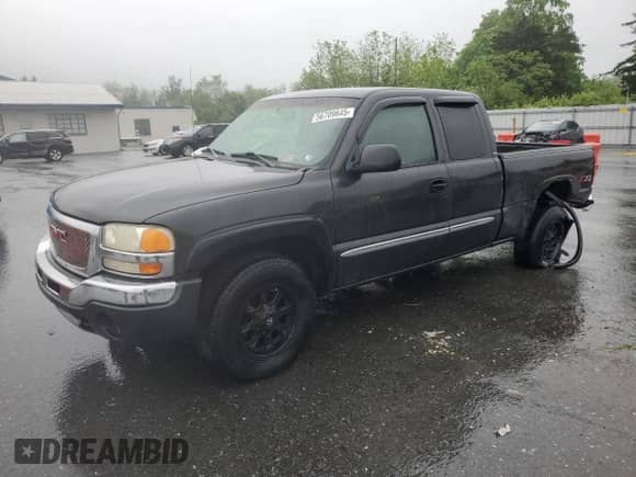 2003 GMC Sierra 1500 SLE with VIN 2GTEK19T731328981, listed as a Copart auction lot 56709645 with 242,866 mi miles and Salvage title. Bid and sale history available at DreamBid. Image 1.