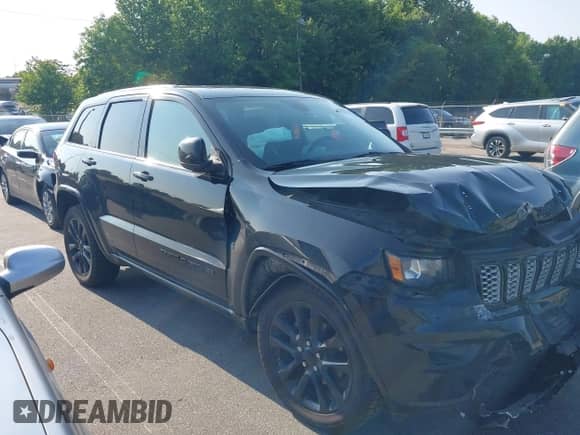 2019 Jeep Grand Cherokee Altitude with VIN 1C4RJFAG9KC703942, listed as a IAAI auction lot 42406792 with 113,556 mi miles and . Bid and sale history available at DreamBid. Image 1.