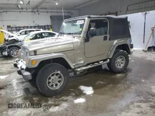 2005 Jeep Wrangler SE z VIN 1J4FA29S25P360452, wystawiony jako Copart lot #86361184 z przebiegiem 137 829 mil mil oraz Szkoda całkowita • Salvage title. Historia ofert i sprzedaży dostępna na DreamBid. Obrazek 1.
