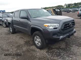 2023 Toyota Tacoma SR with VIN 3TYCZ5AN1PT169840, listed as a IAAI auction lot 43233111 with 21,403 mi miles and . Bid and sale history available at DreamBid. Image 1.