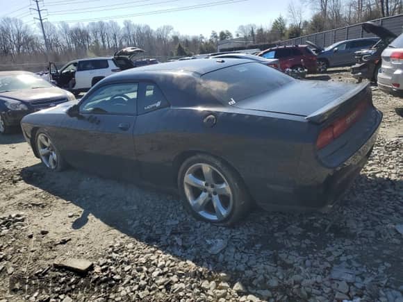 2014 Dodge Challenger R/T Plus with VIN 2C3CDYBT5EH108936, listed as a Copart auction lot 46652305 with 229,673 mi miles and Salvage title. Bid and sale history available at DreamBid. Image 2.