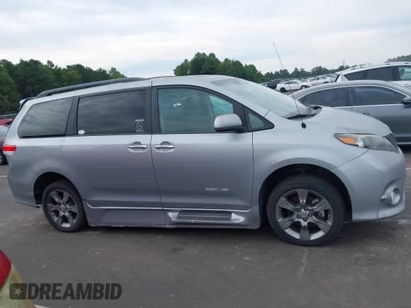 2014 Toyota Sienna SE with VIN 5TDXK3DC6ES421515, listed as a IAAI auction lot 43102179 with 63,756 mi miles and . Bid and sale history available at DreamBid. Image 13.