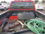 2002 GMC Sierra 1500 SLE z VIN 1GTEK14TX2Z290482, wystawiony jako IAAI lot #43299804 z przebiegiem 144 149 mil mil oraz . Historia ofert i sprzedaży dostępna na DreamBid. Obrazek 8.