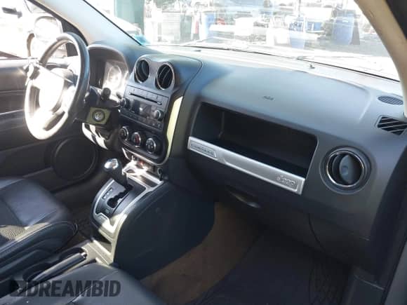 2016 Jeep Compass High Altitude with VIN 1C4NJDEB4GD637335, listed as a IAAI auction lot 43360745 with 146,858 mi miles and . Bid and sale history available at DreamBid. Image 5.