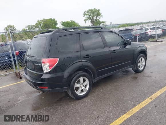 2012 Subaru Forester X z VIN JF2SHBBC1CG423512, wystawiony jako IAAI lot #42412522 z przebiegiem 168 713 mil mil oraz . Historia ofert i sprzedaży dostępna na DreamBid. Obrazek 4.