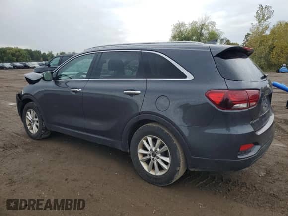2019 Kia Sorento LX z VIN 5XYPG4A38KG466413, wystawiony jako Copart lot #84167395 z przebiegiem 159 174 mil mil oraz Szkoda całkowita • Salvage title. Historia ofert i sprzedaży dostępna na DreamBid. Obrazek 2.