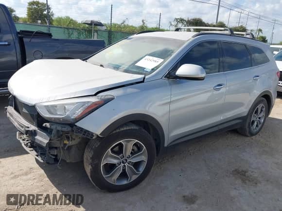 2016 Hyundai Santa Fe SE with VIN KM8SM4HFXGU159717, listed as a IAAI auction lot 43242985 with 165,388 mi miles and . Bid and sale history available at DreamBid. Image 18.