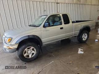 2001 Toyota Tacoma z VIN 5TEWM72N71Z862102, wystawiony jako Copart lot #85427165 z przebiegiem 138 594 mil mil oraz Czysty tytuł • Clean title. Historia ofert i sprzedaży dostępna na DreamBid. Obrazek 1.