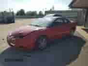 2001 Saturn SC z VIN 1G8ZY127X1Z116460, wystawiony jako Copart lot #67962944 z przebiegiem 93 372 mil mil oraz Nie do naprawy • Non repairable. Historia ofert i sprzedaży dostępna na DreamBid. Obrazek 1.
