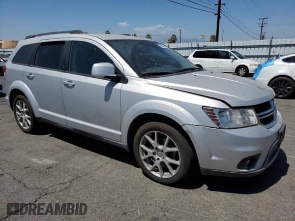 2014 Dodge Journey SXT with VIN 3C4PDCBGXET281359, listed as a Copart auction lot 67804935 with 214,916 mi miles and Clean title. Bid and sale history available at DreamBid. Image 4.