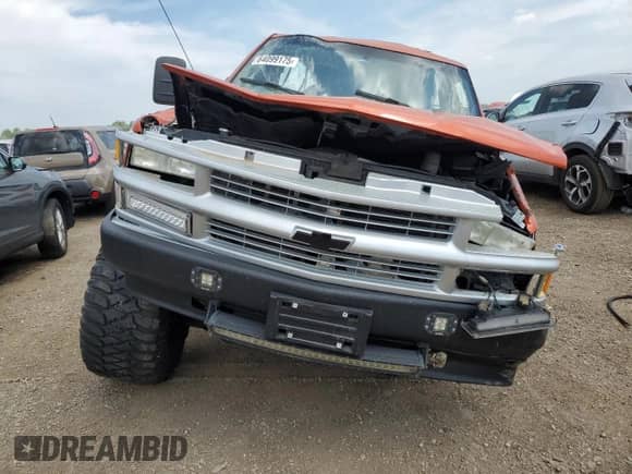1997 Chevrolet Tahoe with VIN 3GNEK18RXVG191123, listed as a Copart auction lot 64099175 with 167,748 mi miles and Salvage title. Bid and sale history available at DreamBid. Image 5.