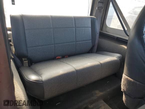 2000 Jeep Wrangler SE with VIN 1J4FA29P4YP775935, listed as a Copart auction lot 80458955 with 100,211 mi miles and Salvage title. Bid and sale history available at DreamBid. Image 11.