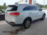 2016 Kia Sorento LX z VIN 5XYPG4A30GG048418, wystawiony jako IAAI lot #43283575 z przebiegiem 113 769 mil mil oraz . Historia ofert i sprzedaży dostępna na DreamBid. Obrazek 4.