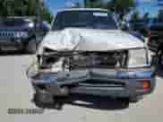 2000 Toyota Tacoma PreRunner with VIN 5TESM92N6YZ695316, listed as a Copart auction lot 87020305 with 296,491 mi miles and Salvage title. Bid and sale history available at DreamBid. Image 5.