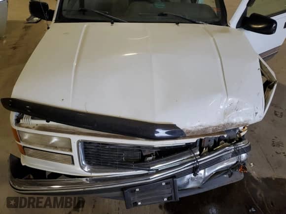 1996 GMC Sierra 1500 z VIN 2GTEC19R3T1500831, wystawiony jako Copart lot #50423235 z przebiegiem 302 075 mil mil oraz Szkoda całkowita • Salvage title. Historia ofert i sprzedaży dostępna na DreamBid. Obrazek 11.