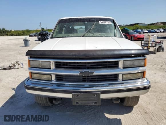 1999 Chevrolet Suburban с VIN 3GNFK16RXXG223742, выставлен на аукционе Copart как лот 54220704 с пробегом Не указан миль и Списание • Salvage title. История ставок и продаж доступна на DreamBid. Изображение 5.