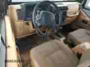 1997 Jeep Wrangler Sport with VIN 1J4FY19S8VP446600, listed as a Copart auction lot 60625905 with 70,322 mi miles and Clean title. Bid and sale history available at DreamBid. Image 8.