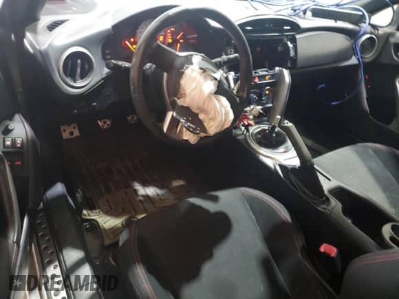 2014 Scion FR-S с VIN JF1ZNAA14E9704863, выставлен на аукционе Copart как лот 64405735 с пробегом 68 112 миль миль и Списание • Salvage title. История ставок и продаж доступна на DreamBid. Изображение 8.
