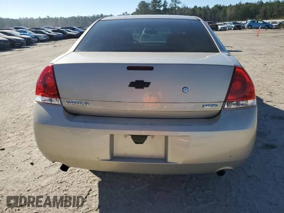2012 Chevrolet Impala Police Police with VIN 2G1WD5E34C1218622, listed as a Copart auction lot 87153394 with 189,578 mi miles and Salvage title. Bid and sale history available at DreamBid. Image 6.