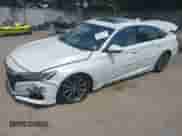 2021 Honda Accord EX-L with VIN 1HGCV1F57MA022974, listed as a IAAI auction lot 42977160 with 42,999 mi miles and . Bid and sale history available at DreamBid. Image 2.