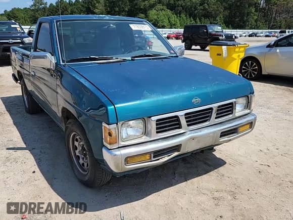 1995 Nissan Frontier with VIN 1N6SD11S3SC358078, listed as a Copart auction lot 71859815 with 118,833 mi miles and Salvage title. Bid and sale history available at DreamBid. Image 14.