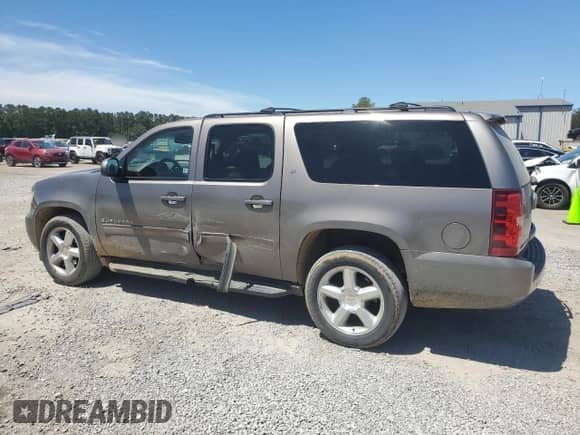 2011 Chevrolet Suburban LT с VIN 1GNSCJE0XBR360008, выставлен на аукционе Copart как лот 57155415 с пробегом 221 035 миль миль и Списание • Salvage title. История ставок и продаж доступна на DreamBid. Изображение 2.