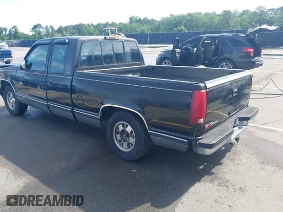 1994 GMC Sierra 1500 z VIN 2GTEC19KXR1537354, wystawiony jako IAAI lot #42125319 z przebiegiem 198 857 mil mil oraz . Historia ofert i sprzedaży dostępna na DreamBid. Obrazek 3.