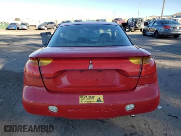 2002 Saturn SC with VIN 1G8ZN12892Z151672, listed as a Copart auction lot 80157144 with Not provided miles and Salvage title. Bid and sale history available at DreamBid. Image 6.