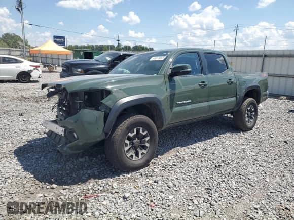 2022 Toyota Tacoma SR с VIN 3TMCZ5AN6NM455059, выставлен на аукционе Copart как лот 65873095 с пробегом 76 189 миль миль и Списание • Salvage title. История ставок и продаж доступна на DreamBid. Изображение 1.