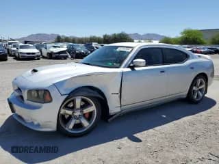 2006 Dodge Charger SRT-8 with VIN 2B3KA73W86H369838, listed as a Copart auction lot 52767384 with 165,630 mi miles and Salvage title. Bid and sale history available at DreamBid. Image 1.