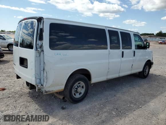 2013 Chevrolet Express Passenger LT with VIN 1GAZG1FG9D1189947, listed as a Copart auction lot 54183165 with 84,745 mi miles and Salvage title. Bid and sale history available at DreamBid. Image 3.