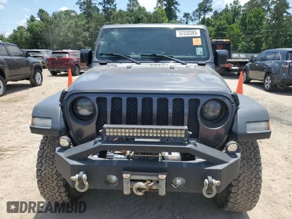 2020 Jeep Wrangler Sport S with VIN 1C4GJXAG8LW312195, listed as a Copart auction lot 57232285 with 102,233 mi miles and Salvage title. Bid and sale history available at DreamBid. Image 5.