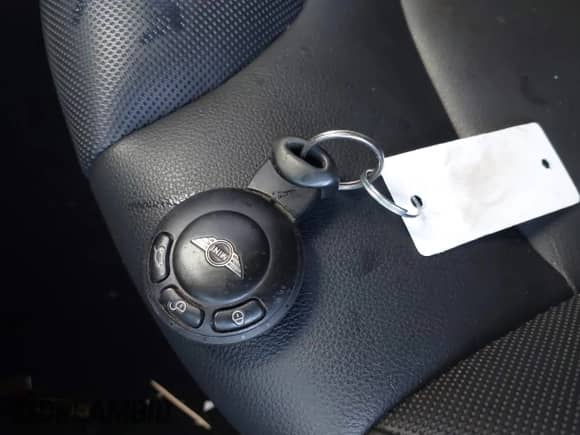 2013 MINI Hardtop with VIN WMWSU3C50DT374065, listed as a IAAI auction lot 43250917 with 107,544 mi miles and . Bid and sale history available at DreamBid. Image 11.