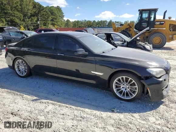 2014 BMW 7 Series 740Li с VIN WBAYE4C54ED137992, выставлен на аукционе Copart как лот 86133095 с пробегом 144 344 миль миль и Чистый • Clean title. История ставок и продаж доступна на DreamBid. Изображение 4.