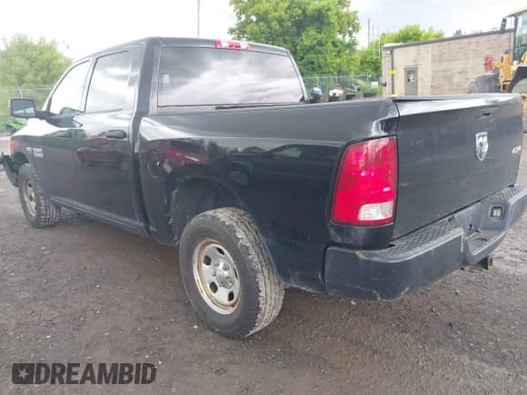 2015 Ram 1500 Tradesman with VIN 3C6RR7KT4FG540718, listed as a IAAI auction lot 42382059 with 197,377 mi miles and . Bid and sale history available at DreamBid. Image 3.