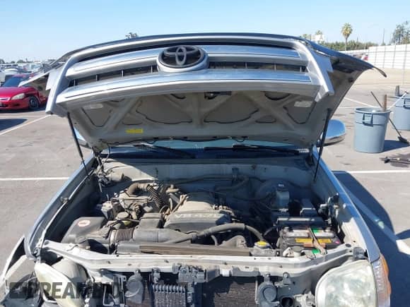2004 Toyota Tundra SR5 z VIN 5TBDT44154S461290, wystawiony jako IAAI lot #43278955 z przebiegiem 200 462 mil mil oraz . Historia ofert i sprzedaży dostępna na DreamBid. Obrazek 10.
