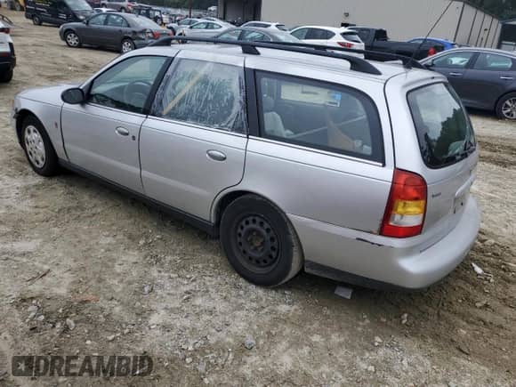 2001 Saturn LW with VIN 1G8JU82F71Y577940, listed as a Copart auction lot 71680985 with 233,817 mi miles and Salvage title. Bid and sale history available at DreamBid. Image 2.