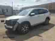 2020 Honda Pilot Touring 8-Passenger z VIN 5FNYF6H94LB051790, wystawiony jako Copart lot #67845865 z przebiegiem 63 874 mil mil oraz Szkoda całkowita • Salvage title. Historia ofert i sprzedaży dostępna na DreamBid. Obrazek 1.