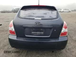 2007 Hyundai Accent GS z VIN KMHCM36C87U004056, wystawiony jako Copart lot #70292314 z przebiegiem 107 760 mil mil oraz Szkoda całkowita • Salvage title. Historia ofert i sprzedaży dostępna na DreamBid. Obrazek 6.