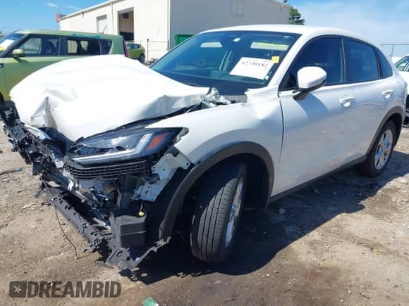 2025 Honda HR-V LX z VIN 3CZRZ1H33SM715270, wystawiony jako IAAI lot #42730182 z przebiegiem 6 254 mil mil oraz . Historia ofert i sprzedaży dostępna na DreamBid. Obrazek 17.