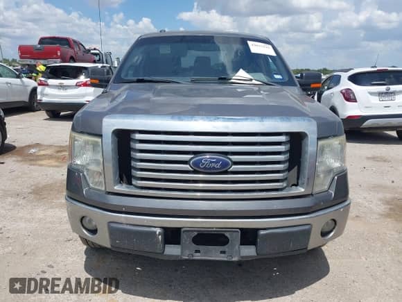 2011 Ford F-150 XL z VIN 1FTFW1CFXBKD37300, wystawiony jako IAAI lot #43023225 z przebiegiem 157 288 mil mil oraz . Historia ofert i sprzedaży dostępna na DreamBid. Obrazek 12.