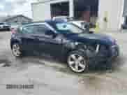 2015 Hyundai Veloster z VIN KMHTC6AD0FU237545, wystawiony jako Copart lot #69858765 z przebiegiem 182 058 mil mil oraz Szkoda całkowita • Salvage title. Historia ofert i sprzedaży dostępna na DreamBid. Obrazek 4.