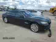 2011 BMW 7 Series with VIN WBAKX8C57BC198326, listed as a Copart auction lot 69985174 with 142,353 mi miles and Clean title. Bid and sale history available at DreamBid. Image 4.